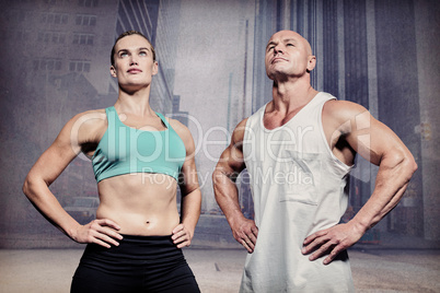 Composite image of low angle view of confident athletes with han