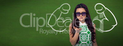 Composite image of asian woman blowing kiss to the camera