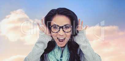 Composite image of asian woman shouting to the camera