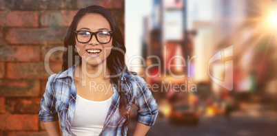 Composite image of asian woman smiling to the camera