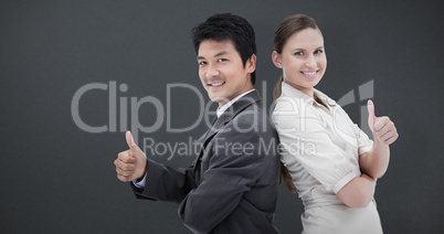 Composite image of business people standing back-to-back with th