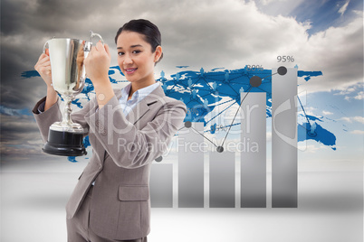 Composite image of portrait of a businesswoman holding a cup