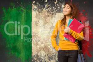 Composite image of female college student with books in park