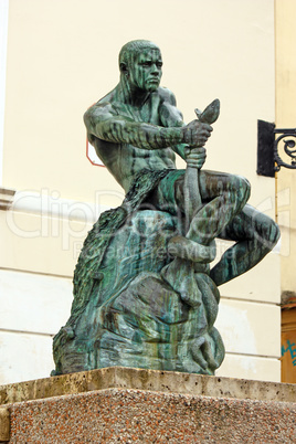 Fisherman with Snake, statue