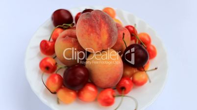 Fresh peaches, plums and cherries are rotated