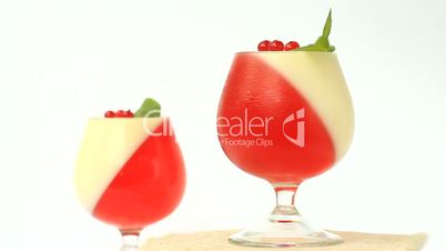 jelly dessert with berries in a glass