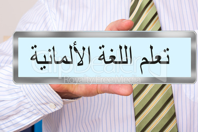 Man holds sign with Arabic inscription, Learn German