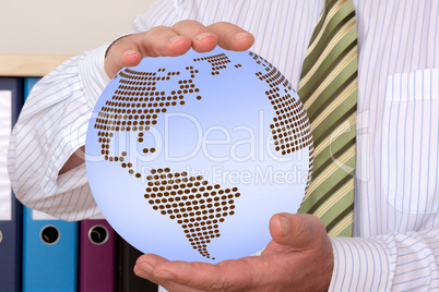 Businessman holding globe