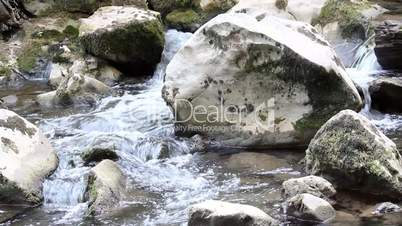 creek with rocks nature scene