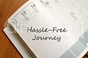 Hassle free journey write on notebook