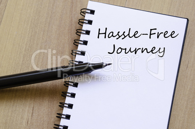 Hassle free journey write on notebook