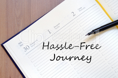 Hassle free journey write on notebook