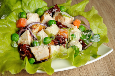 A portion of salad in lettuce leaves