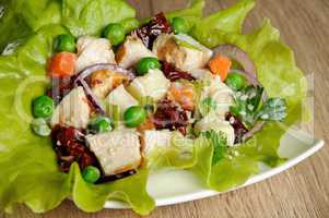 A portion of salad in lettuce leaves