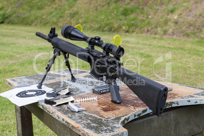 weapon and target sign on a table