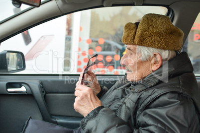Senior in a car