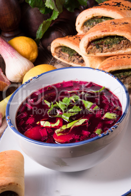 beet green soup with pastries