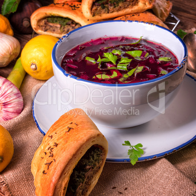 beet green soup with pastries