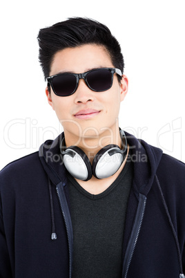 Young man in sunglasses and headphones