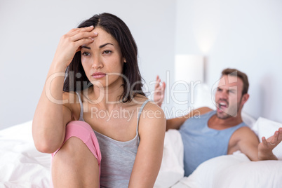 Couple in to argument on bed