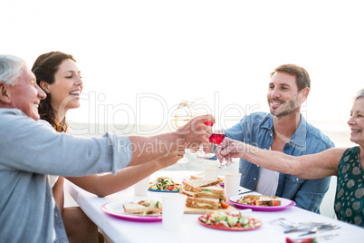 Happy family having a picnic at the beach