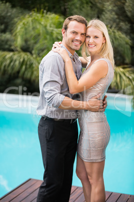 Portrait of smiling couple hugging