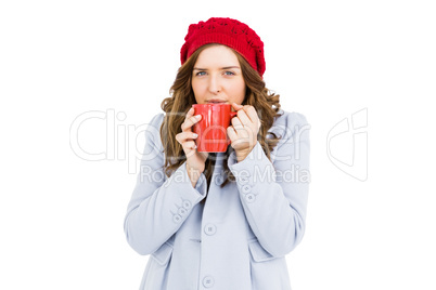 Young woman having cup of coffee