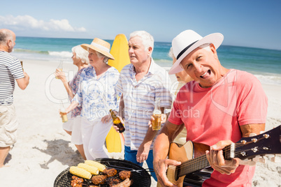 Senior friends having a barbecue