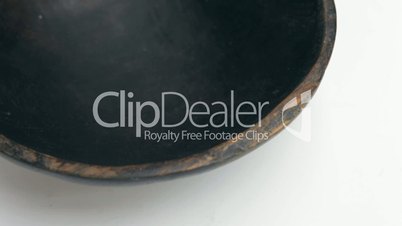 linseed flax pouring into rustic bowl close-up Isolated Superfood