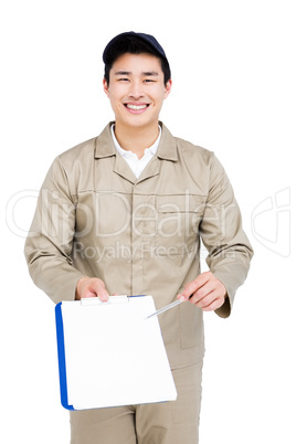 Happy delivery man with clipboard