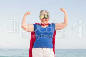 Senior woman pretending to be a superhero