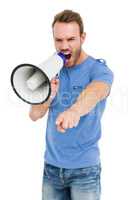 Young man shouting on horn loudspeaker