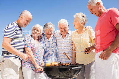 Senior friends having a barbecue