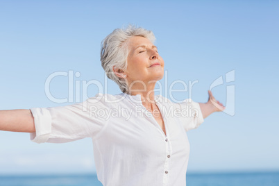 Senior woman relaxing on the beach