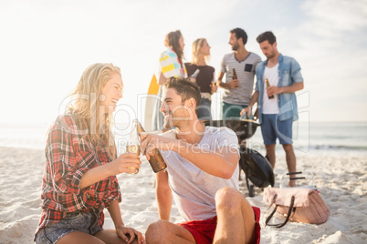 Happy friends having fun around barbecue