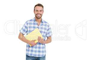 Happy young man holding folder
