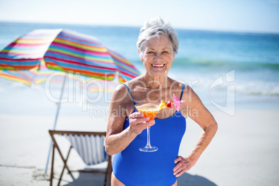 Pretty mature woman having a cocktail