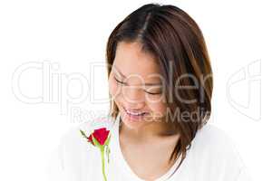Happy woman holding red rose
