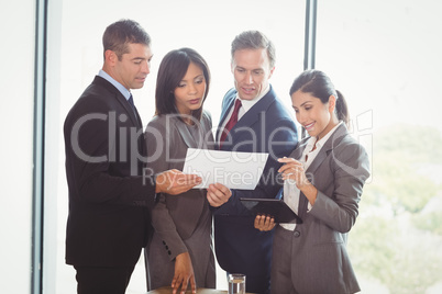 Businesspeople working in office