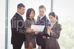 Businesspeople working in office