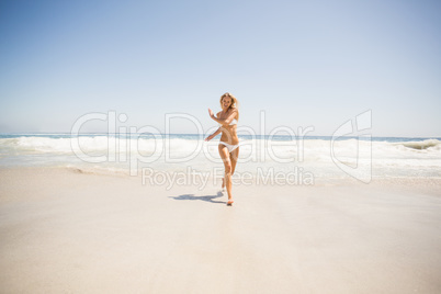 Woman running on the beach