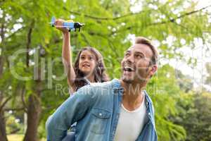 Father and daughter having fun