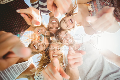 Group of friends forming a huddle