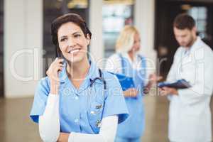 Nurse talking on mobile phone