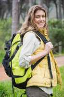 Smiling woman with backpack