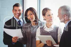 Businesspeople working in office