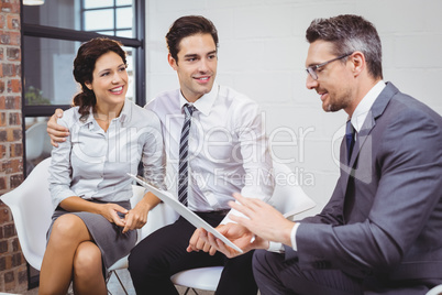 Businessman discussing with client