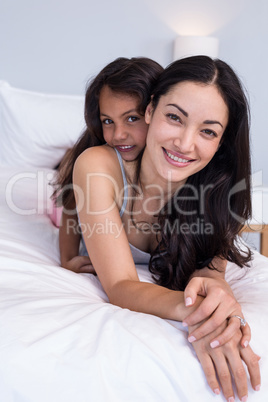 Woman relaxing with her daughter