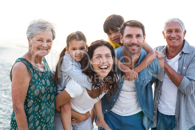 Happy family posing at the beach