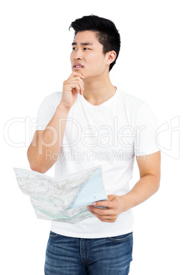 Young man looking at map